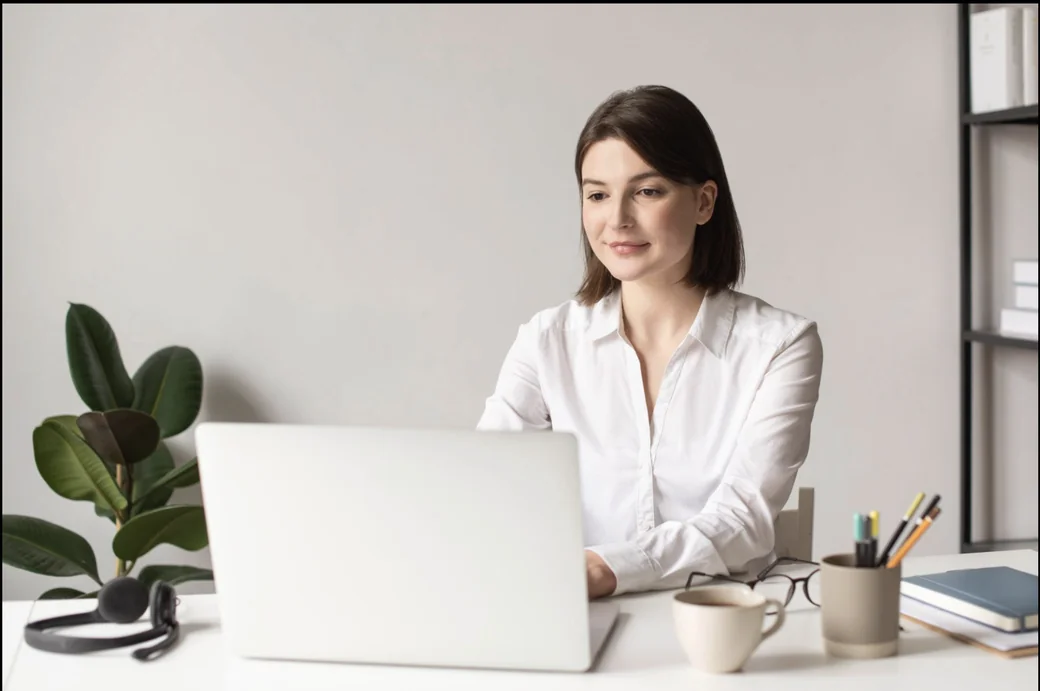 A small business owner working calmly with AI